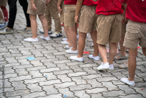 Uniformed children aligned legs © Hanoi Photography