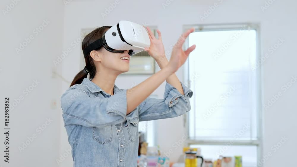 Woman watching with virtual reality device Woman watching with virtual reality device