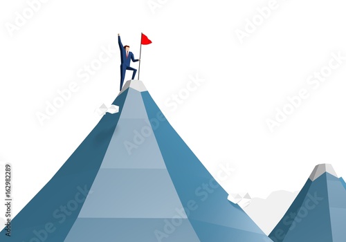 Businessman with flag on mountain top