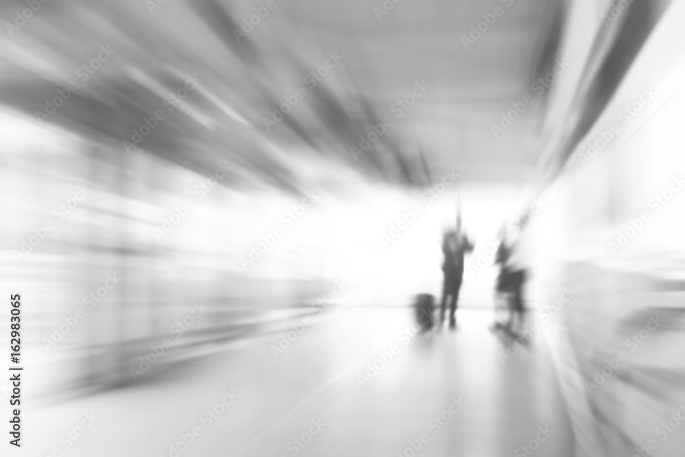 White gray business abstract background with people standing in the corridor, zoom effect