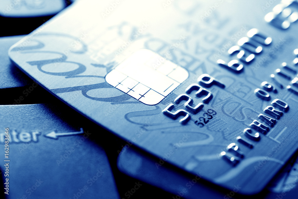 Close up of credit card with chip and numbers Close up of credit card with chip and numbers