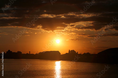 Photo of a bright sea sunset