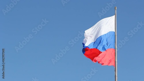 Flag russia in the wind symbol of the country