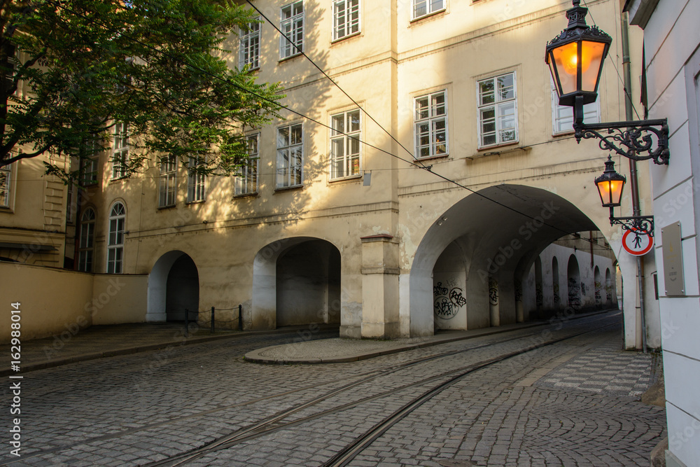 Tramways passing under buildings in Prague, Czech Republic