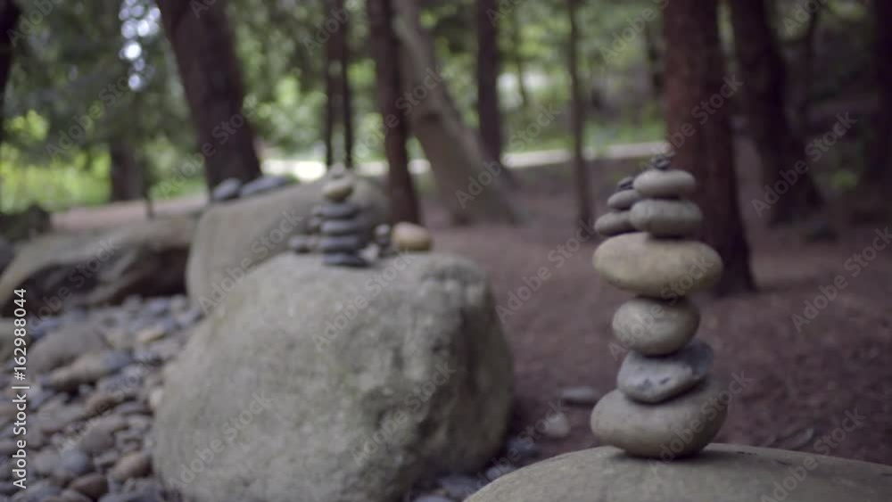 Closeup Of Rock Cairns (Rack Focus) In An Empty River Bed In A Beautiful Park Setting, Shot In 4K Closeup Of Rock Cairns (Rack Focus) In An Empty River Bed In A Beautiful Park Setting, Shot In 4K