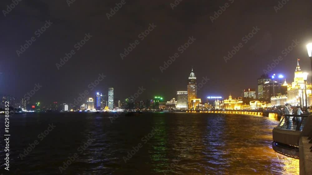 night of Shanghai Bund,huangpu river waterfront & Tourists crowded. night of Shanghai Bund,huangpu river waterfront & Tourists crowded.