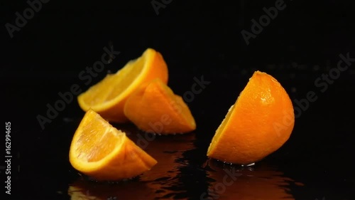 High quality video of falling quarter of orange in real 1080p slow motion 250fps