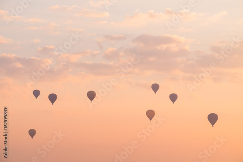 Hot Air Balloon with Dramatic Sky in Morning