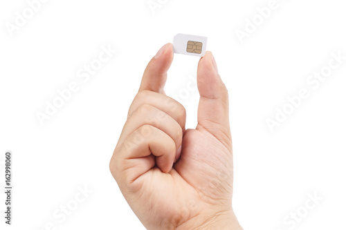 Hand holding sim card. isolated on white background.