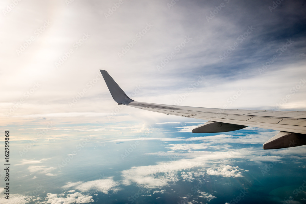 airplane wing with beautiful sky airplane wing with beautiful sky