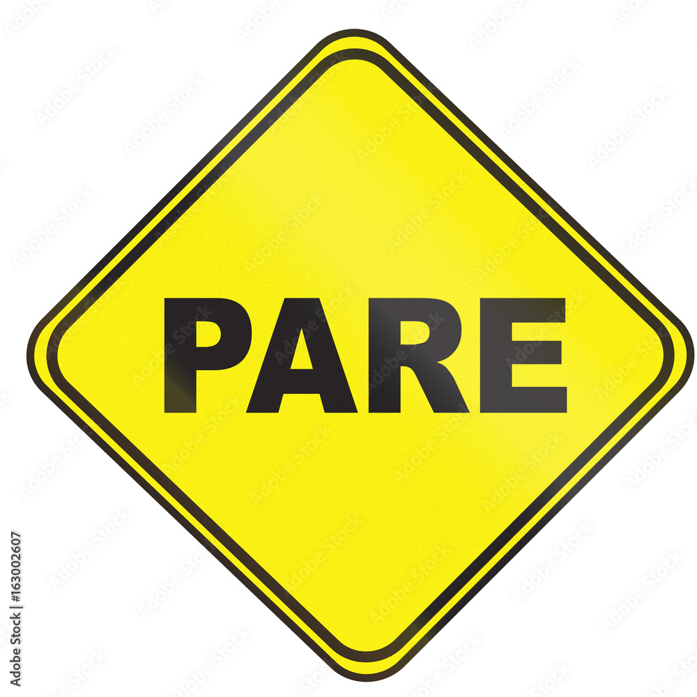 Stop ahead warning sign in Uruguay. Pare means stop in Portuguese Stop ahead warning sign in Uruguay. Pare means stop in Portuguese