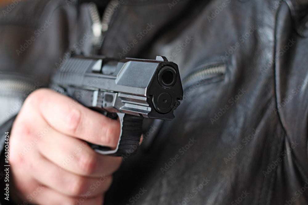 man with hand gun pistol rubber attack violence man with hand gun pistol rubber attack violence