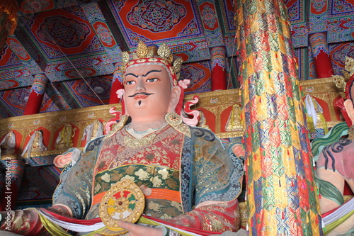 Tibetan and Chinese Figures in an Amdo Tibetan Monastery Temple in Qinghai Province China Asia