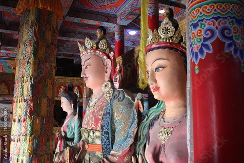 Tibetan and Chinese Figures in an Amdo Tibetan Monastery Temple in Qinghai Province China Asia