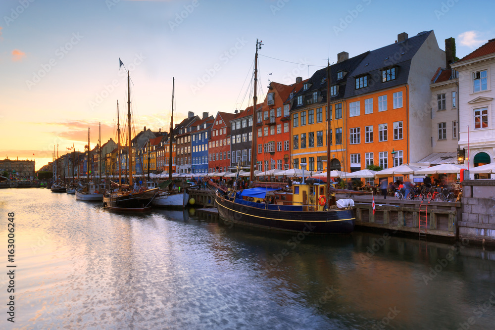 famous Nyhavn pier architecture in the Old Town of Copenhagen, Denmark