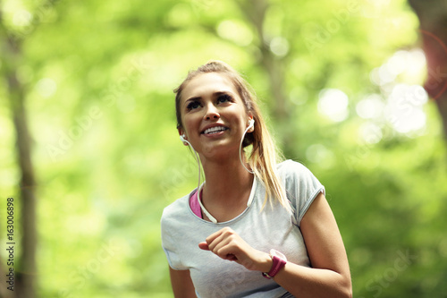 Woman jogging in the forest