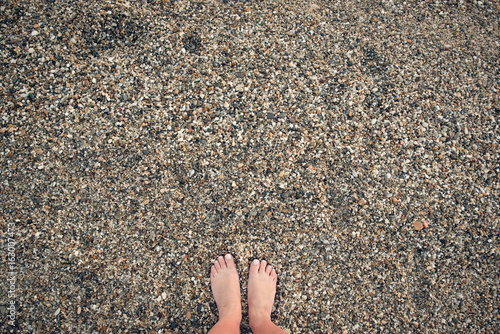 Woman's feet on the beach