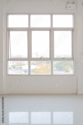 Fototapeta Naklejka Na Ścianę i Meble -  glass window sliding on white wall interior house..
