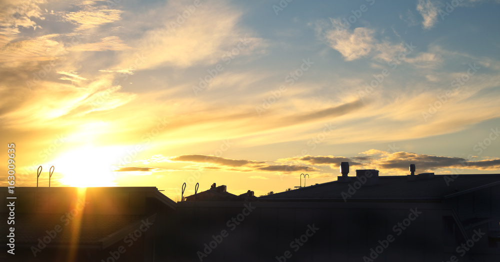 Sunset over houses