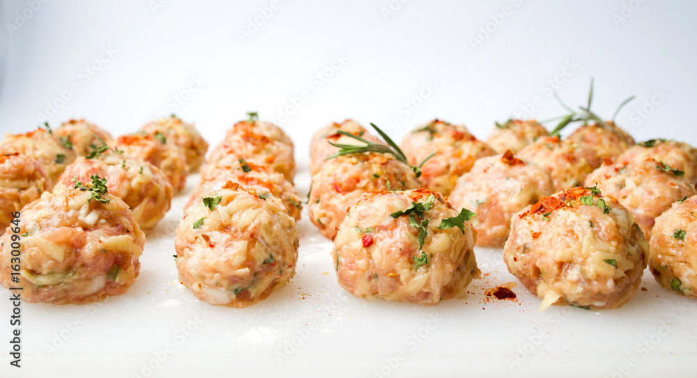Raw meatballs ready for frying Raw meatballs ready for frying