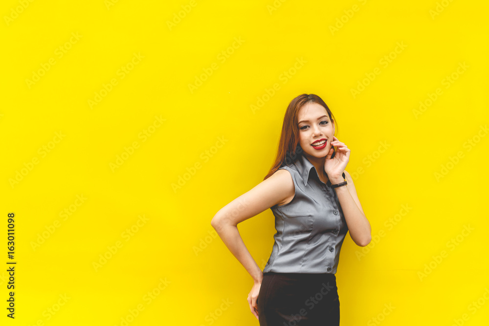 Fashion image of beautiful woman on yellow background Fashion image of beautiful woman on yellow background