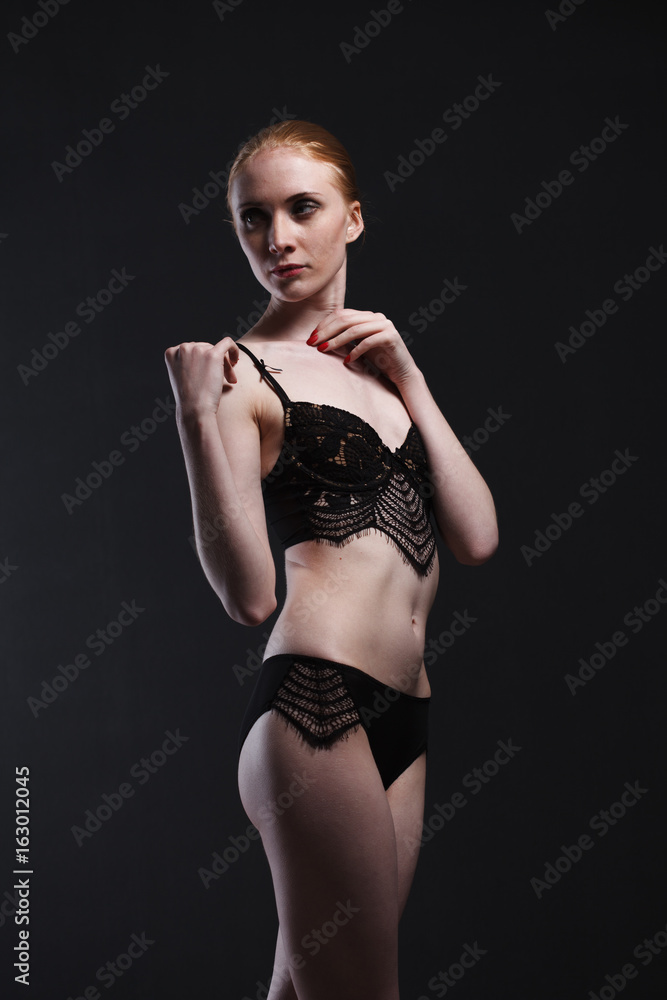 Fototapeta premium Sexy girl in underwear posing in studio