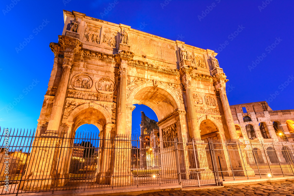 The Arch of Constantine and  the Colosseum in Rome, Italy