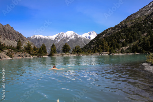 Swimming in a mountain lake   © Sergey Shapkin