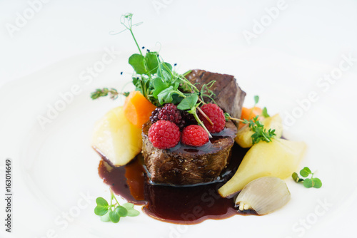 steak with berry sauce