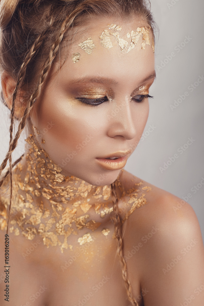 Beauty portrait of beautiful woman. gold portrait Beauty portrait of beautiful woman. gold portrait