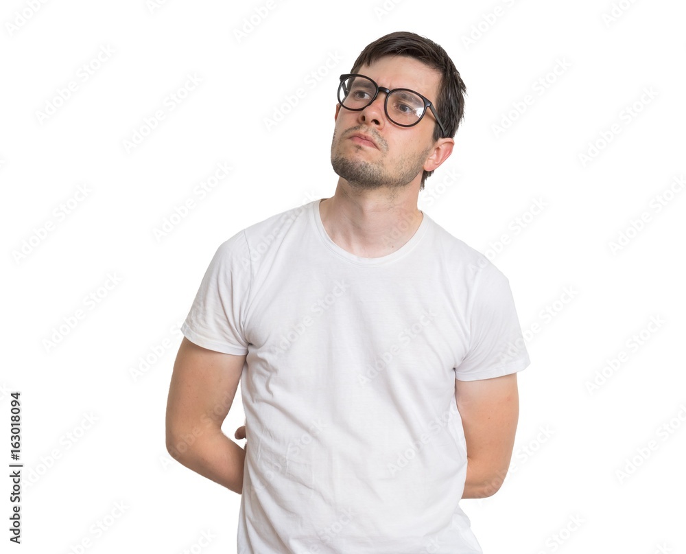 Young man with glasses is thinking. Isolated on white background. Young man with glasses is thinking. Isolated on white background.