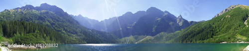 Panorama from Morskie Oko and Rysy in Tatra Mountains in Poland during lovely sunny weather