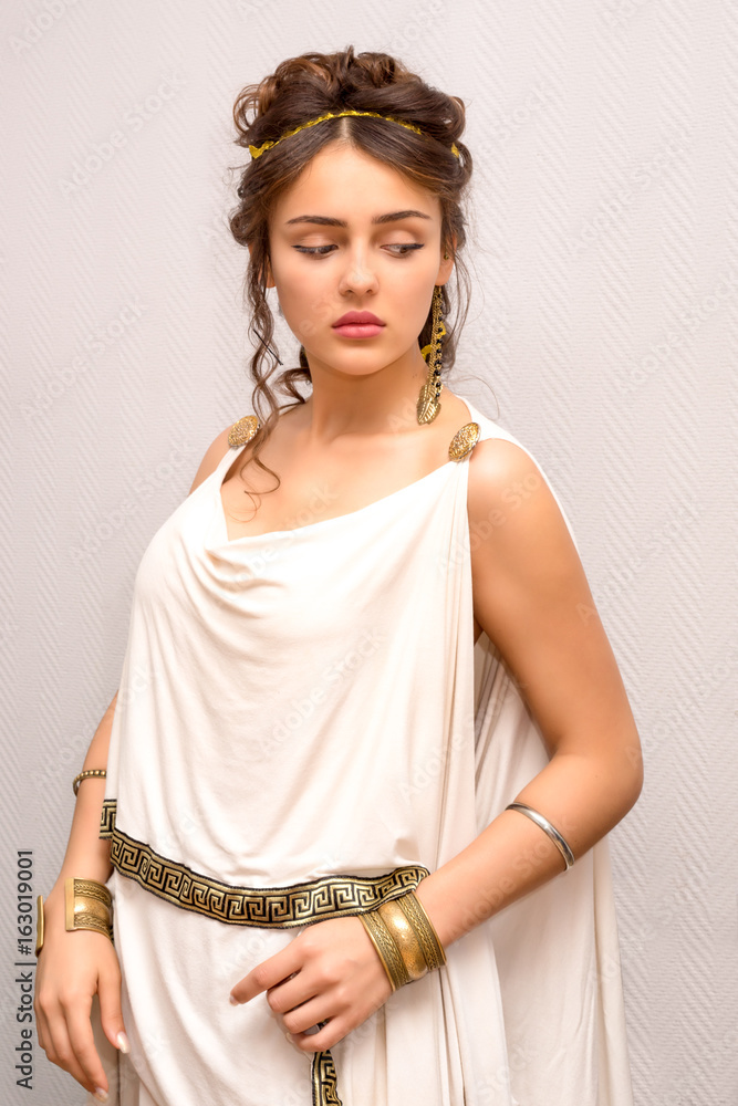 portrait of a beautiful graceful greek young woman in antique white toga - obrazy, fototapety, plakaty 