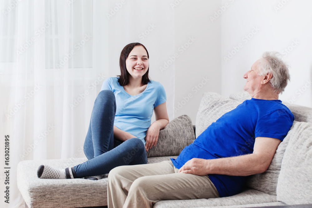 Grandfather with his granddaughter indoor Grandfather with his granddaughter indoor