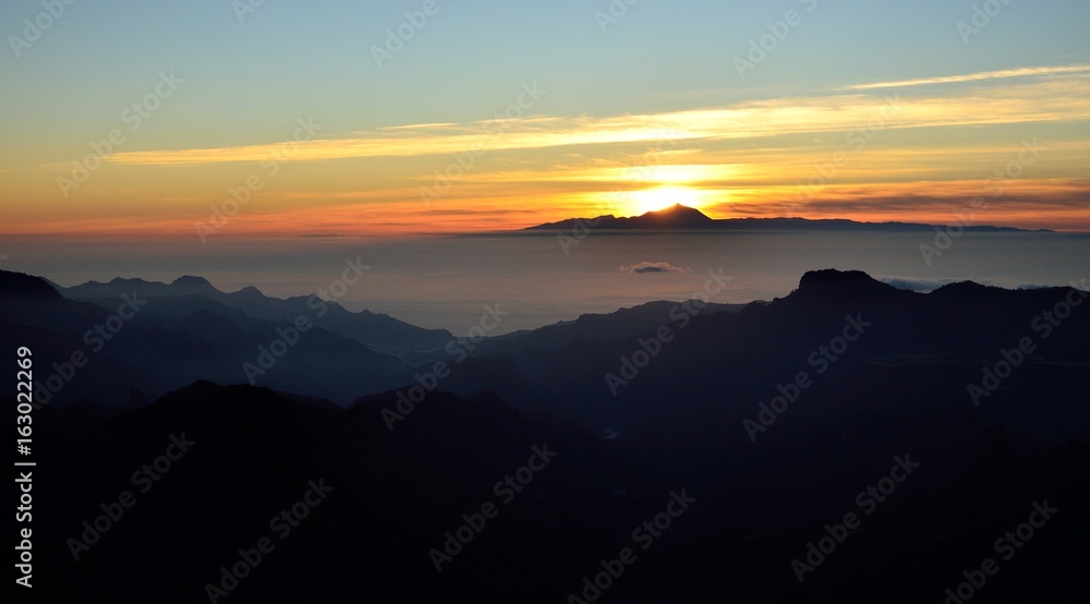 Sunset, Gran canaria in foreground and Tenerife in background, Canary islands Sunset, Gran canaria in foreground and Tenerife in background, Canary islands