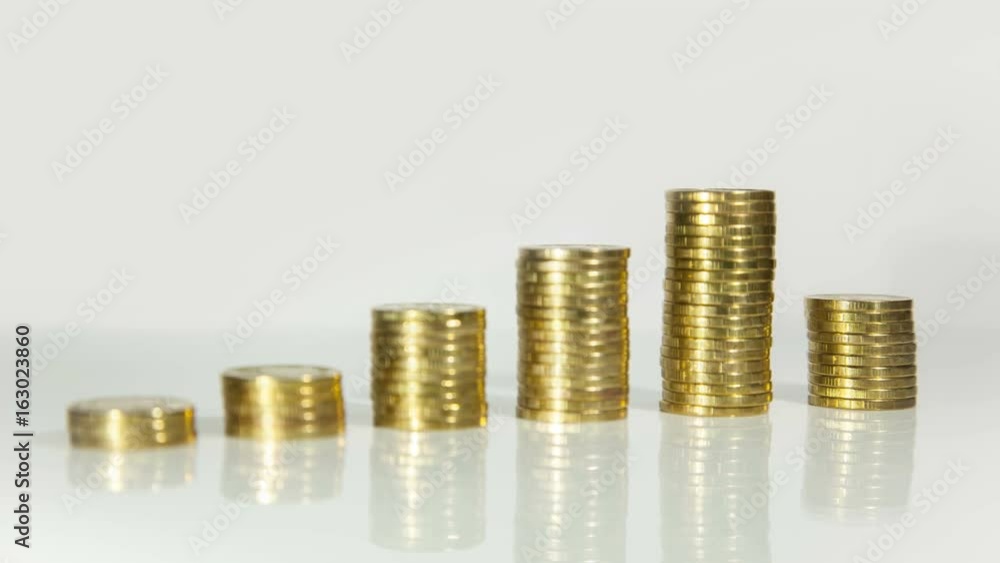 Consecutive alignment of columns of coins. Financial growth, profit. Consecutive alignment of columns of coins. Financial growth, profit.