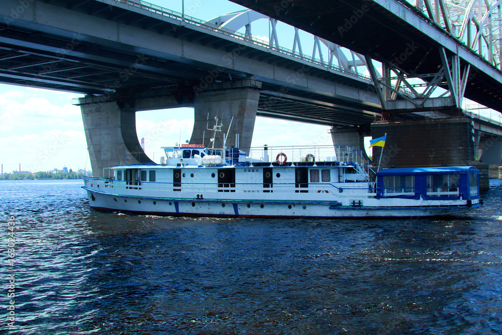 Motorboat. Boat going on the river. Touristic boat on the Dnieper river in Kiev