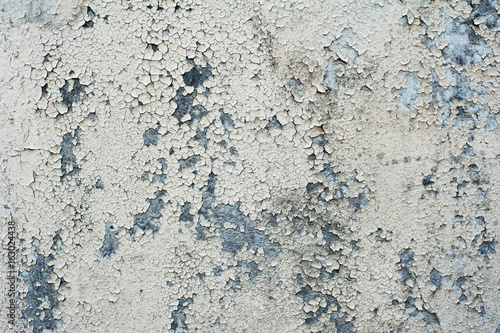 Old wall texture with cracked white paint © katjabakurova