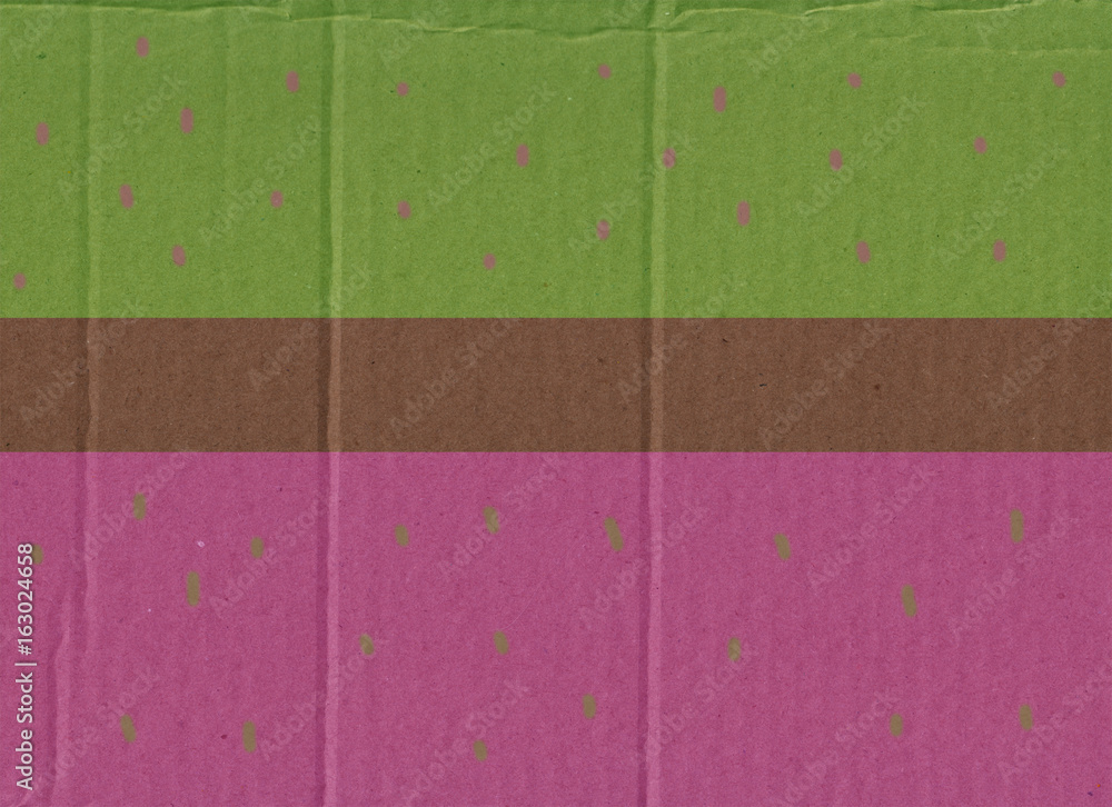 Fototapeta premium Green and pink background on cardboard