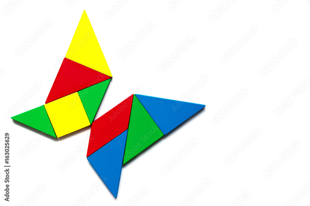 Colorful tangram as butterfly shape on white background Colorful tangram as butterfly shape on white background