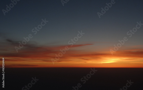 Sunrise seen from airplane © Sjaak