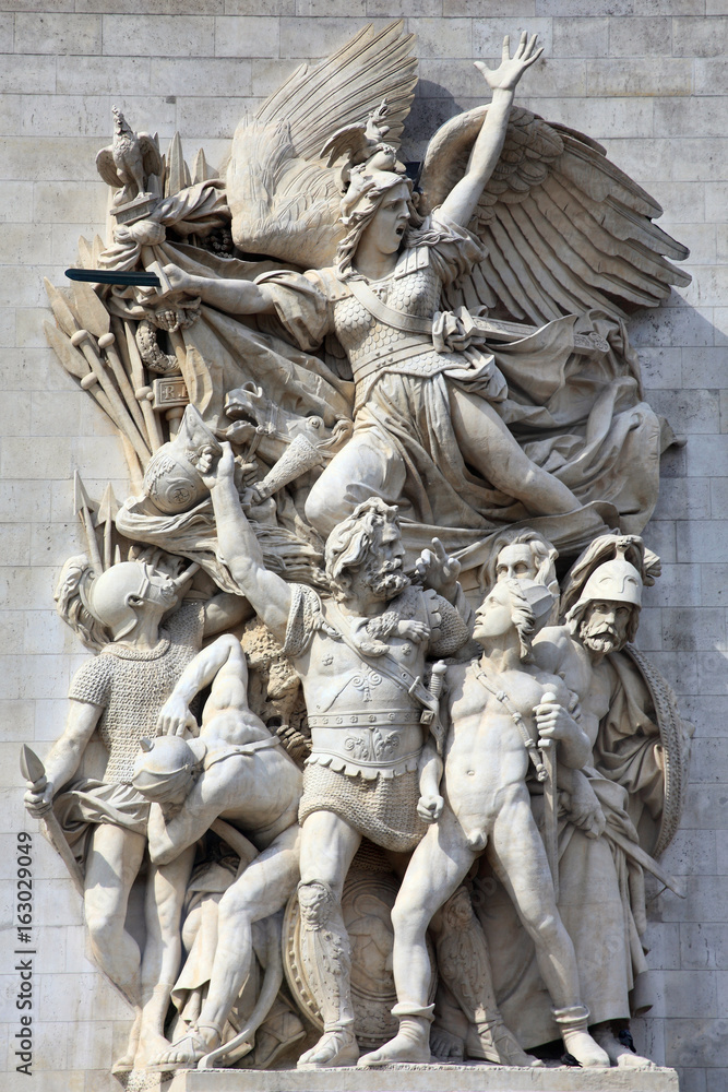 Paris, France, September 16, 2011 : Le Depart, sculpture on the Arc De Triomphe which celebrates the cause of the French First Republic and shows winged liberty above the volunteers Paris, France, September 16, 2011 : Le Depart, sculpture on the Arc De Triomphe which celebrates the cause of the French First Republic and shows winged liberty above the volunteers