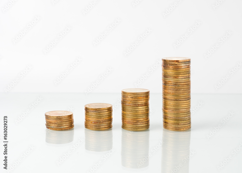 stacks of golden coins on white background stacks of golden coins on white background