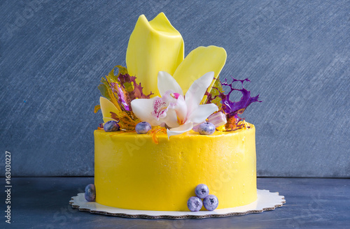 yellow cream cheese cake with chocolate twist and isomalt decoration