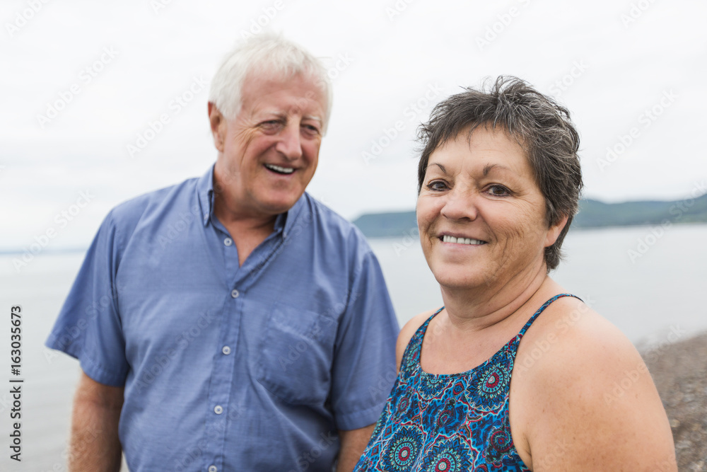 Portrait of loving senior couple at the beach