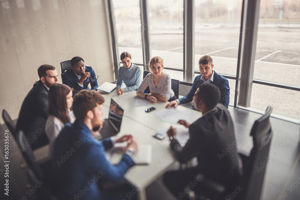 Corporate business team and manager in a meeting - obrazy, fototapety, plakaty 