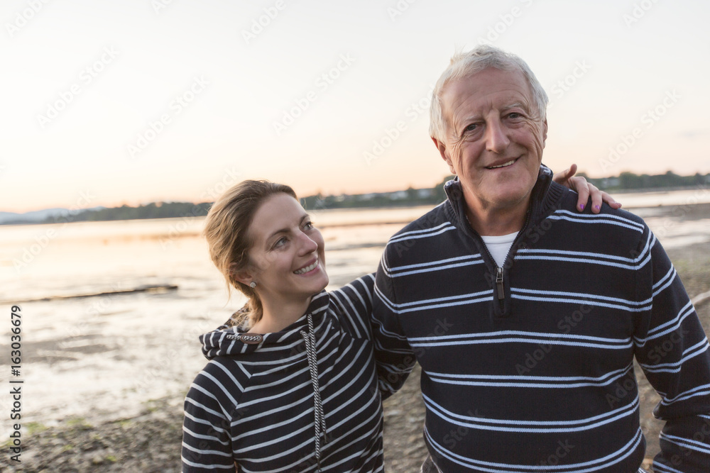 Senior father With Adult Daughter At Sea