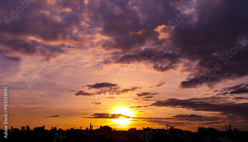 Raising sun, sunset with cloudy sky, yellow, orange, blue color sunlight, for beautiful nature background