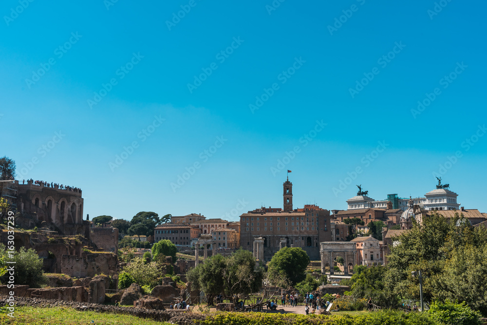 Tourists visiting the Roman Forum in Rome