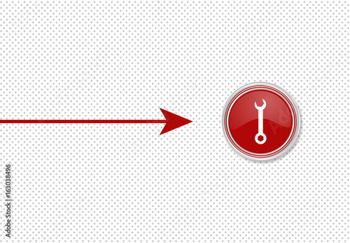 Pfeil zeigt auf Knopf - Schraubenschlüssel